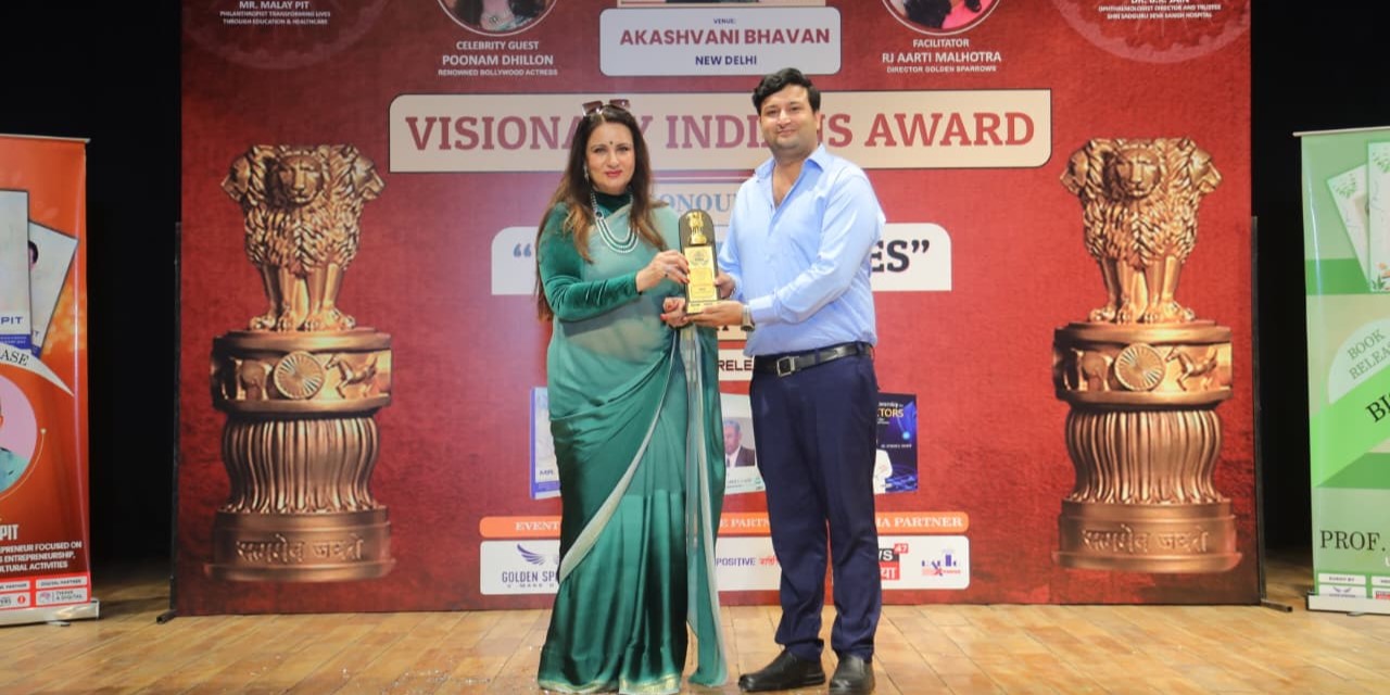Dr. Prince Kumar Mishra receiving Visionary Indian Award from Poonam Dhillon at Akashwani Bhavan, Ministry of Government of India