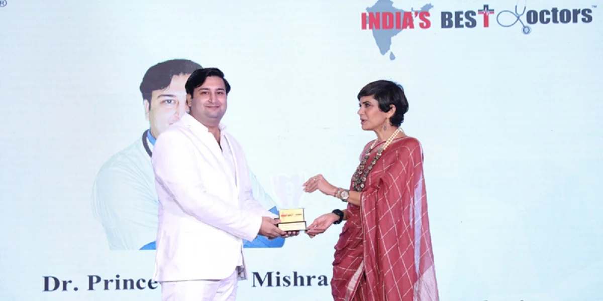 Dr. Prince Kumar Mishra receiving India Best Doctor Award from Mandira Bedi in Delhi
